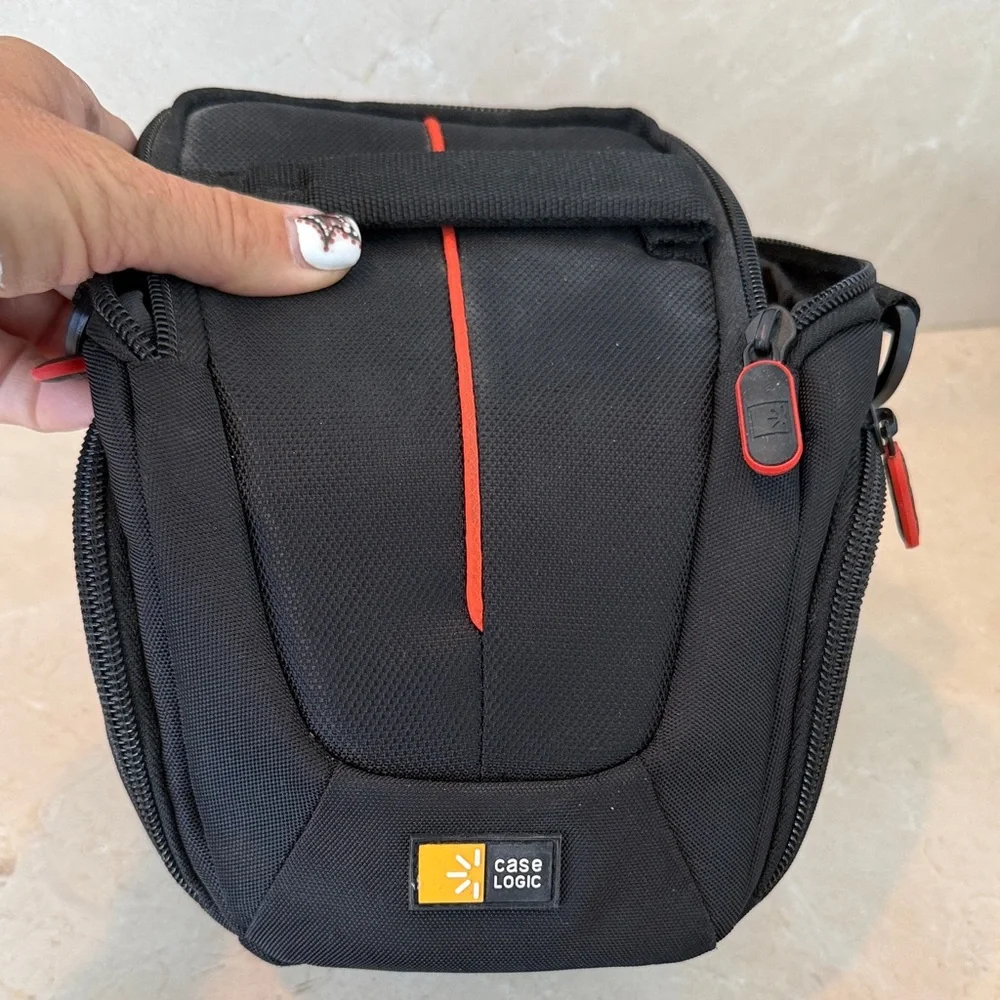 Canon Black Camera with Red Interior Case